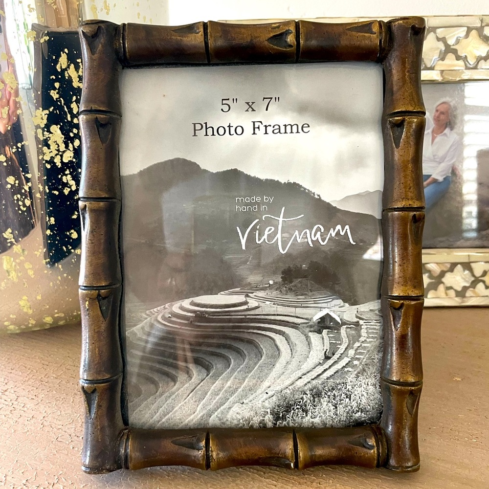 Antiqued bronze metal photo frame.